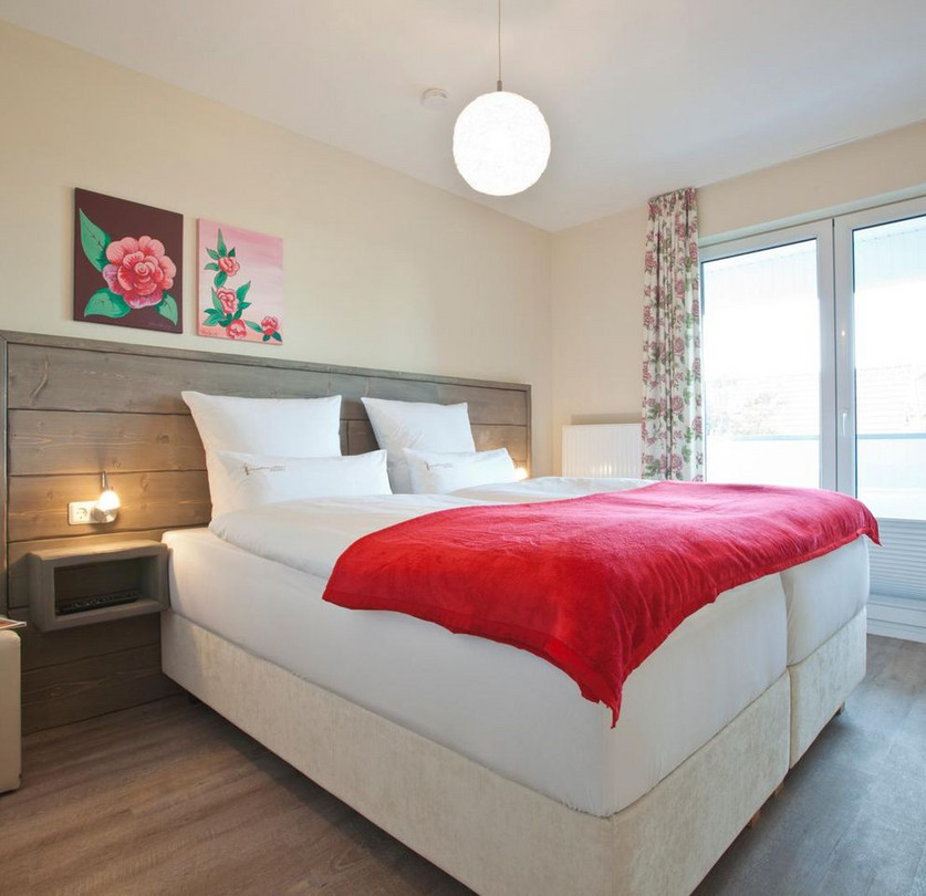 Ferienwohnung Haus Inselzauber Dünenrose Schlafzimmer